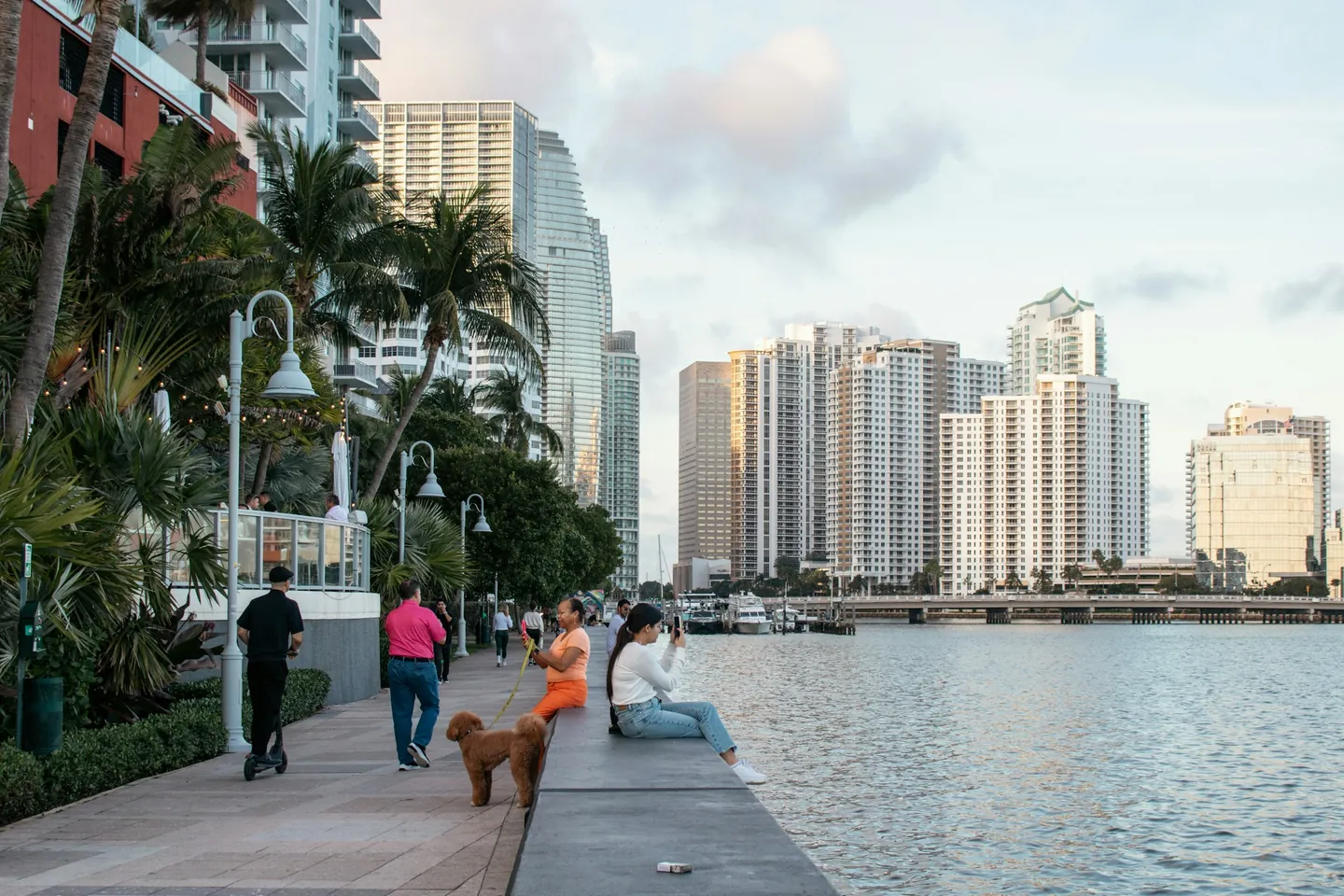 People walking on the waterfront opposite Brickell Key